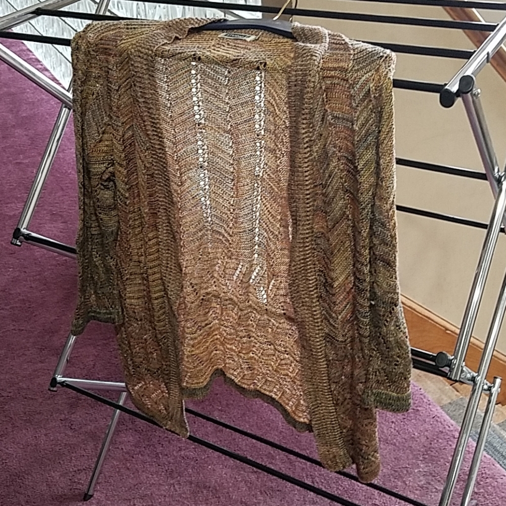 Detailed cut out open front rust orange sweater
